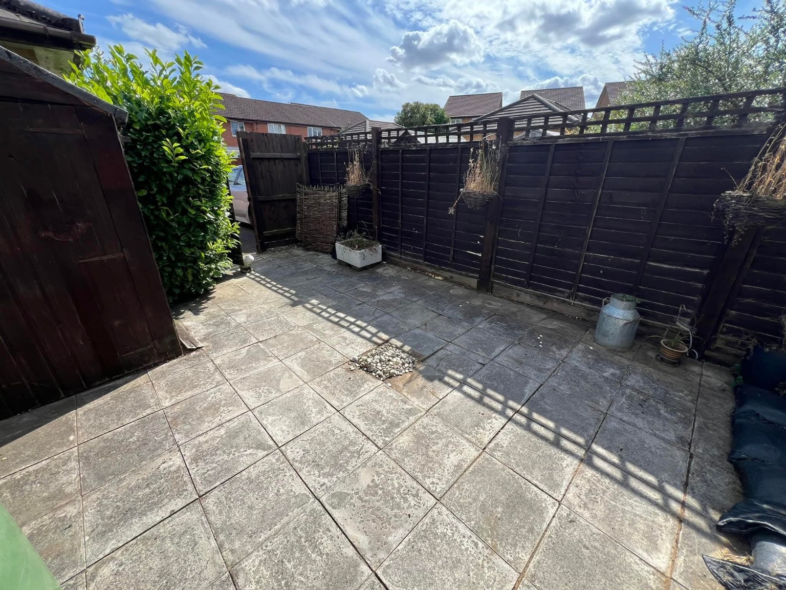 Patio with weeds removed from the slab joints